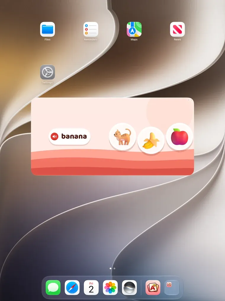 An iPad Home Screen with the VocabPeek Junior widget in the middle: a speaker button and the word banana, beside pictures of a cat, a banana and an apple